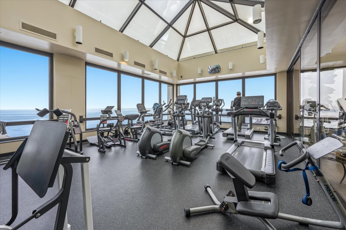 360 East Randolph Street, Unit 1002 Chicago, IL 60601 - Photo 23 of 27 a view of a room with gym equipment