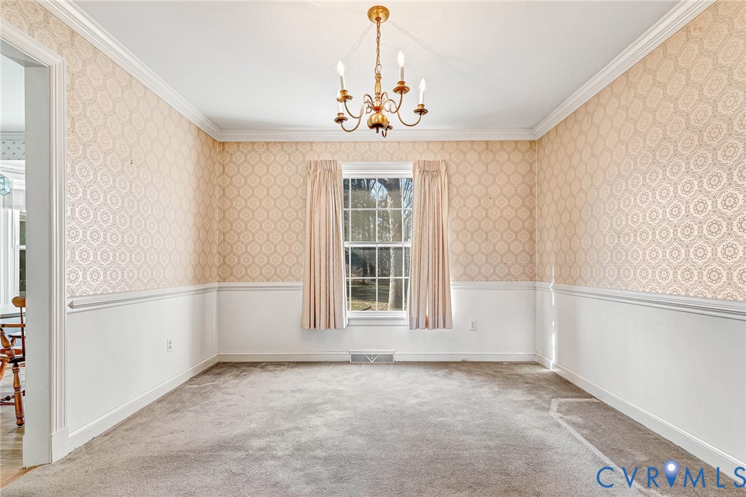 2820 Euphoria Road Chester, VA 23831 - Photo 18 of 38 Unfurnished dining area with a wainscoted wall, a