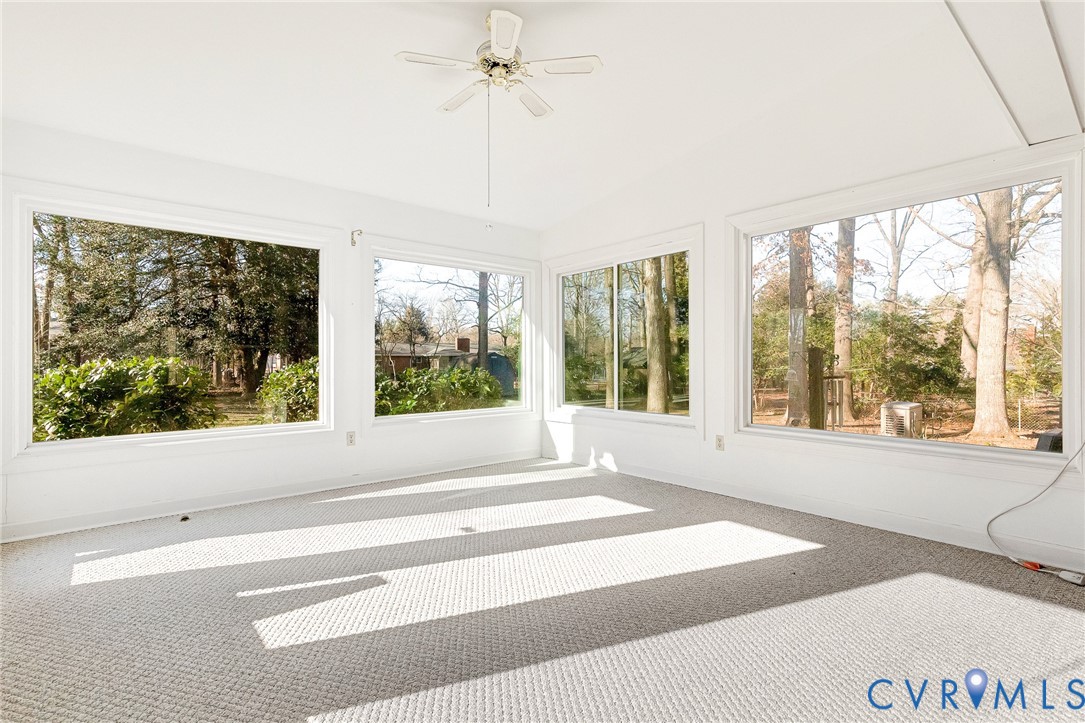 2820 Euphoria Road Chester, VA 23831 - Photo 19 of 38 Unfurnished sunroom with carpet flooring and vault