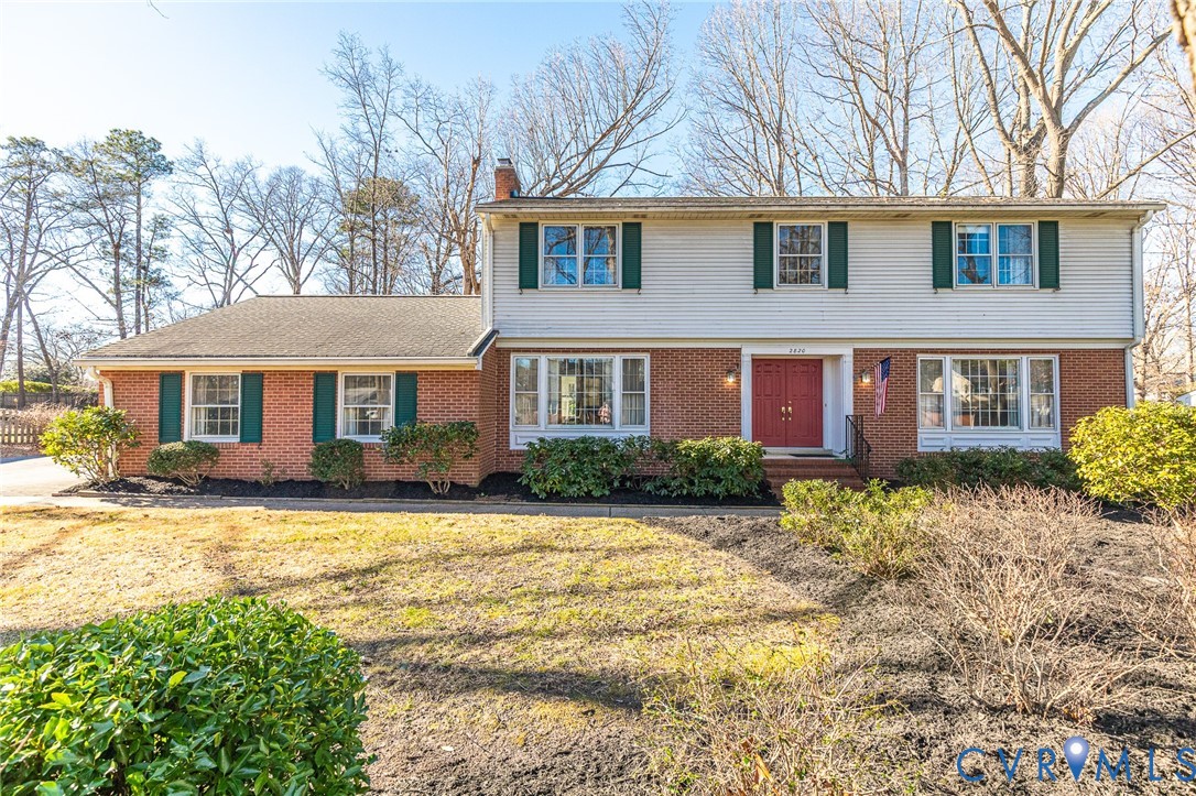 2820 Euphoria Road Chester, VA 23831 - Photo 2 of 38 Colonial-style house with a chimney, a front yard,