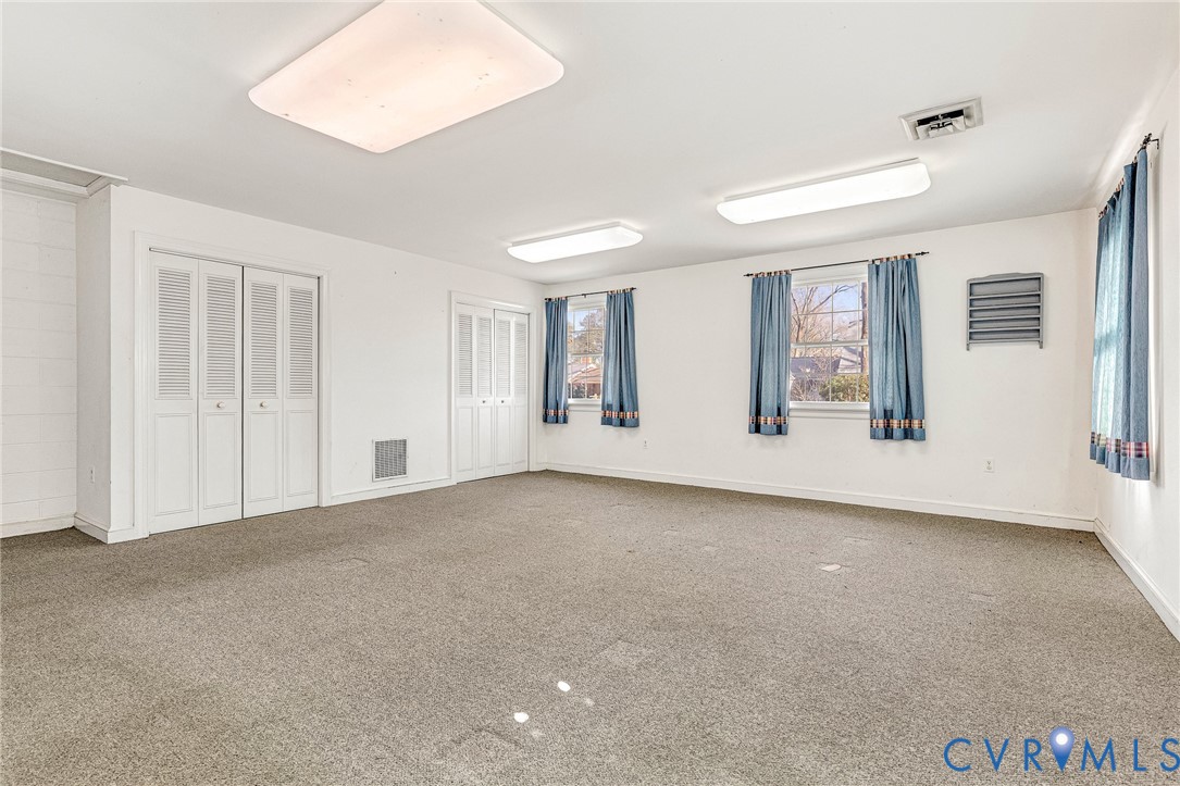 2820 Euphoria Road Chester, VA 23831 - Photo 25 of 38 Unfurnished bedroom featuring multiple closets and