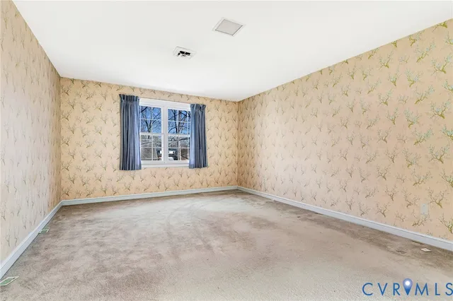 en empty room with windows