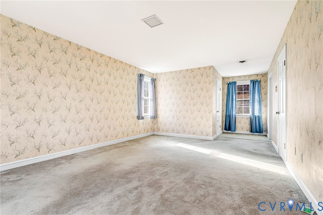 2820 Euphoria Road Chester, VA 23831 - Photo 28 of 38 Carpeted empty room featuring baseboards