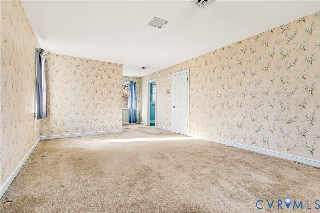 2820 Euphoria Road Chester, VA 23831 - Photo 29 of 38 Spare room featuring wallpapered walls and carpet