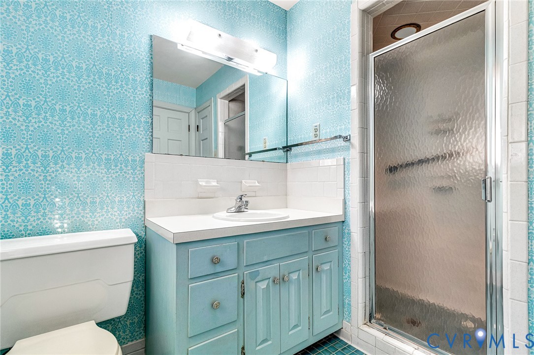 2820 Euphoria Road Chester, VA 23831 - Photo 32 of 38 Full bathroom featuring a stall shower, vanity, wa