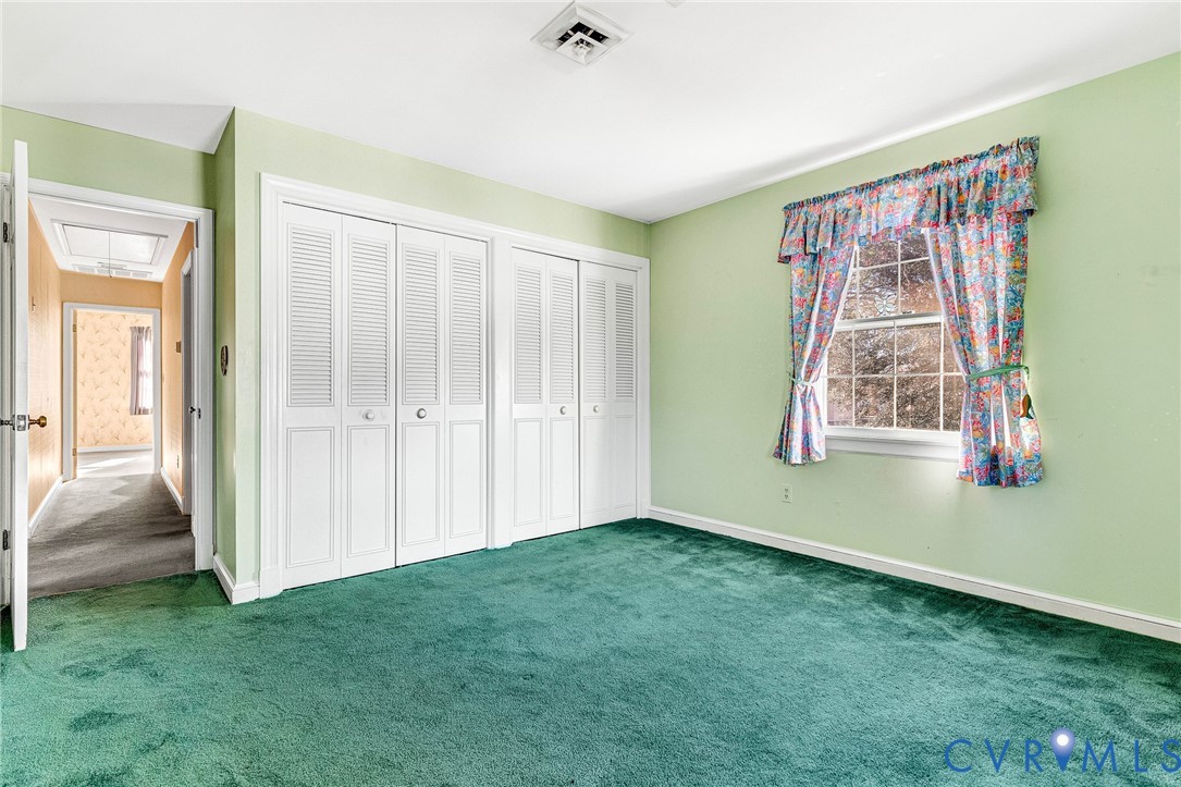 2820 Euphoria Road Chester, VA 23831 - Photo 34 of 38 Unfurnished bedroom with two closets, carpet floor