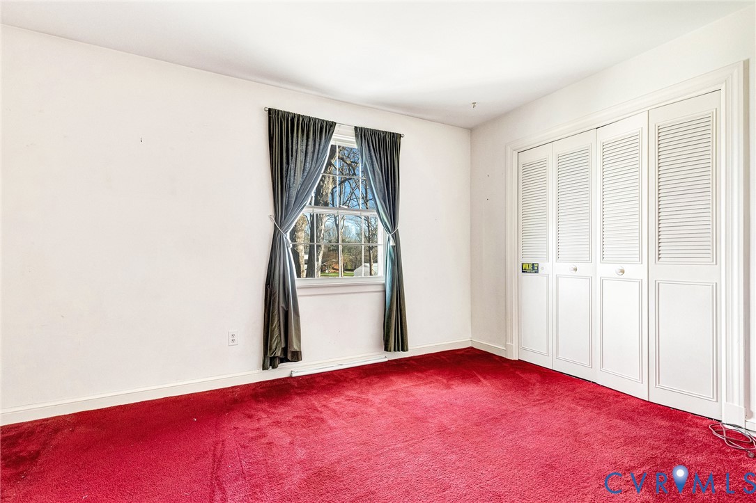 2820 Euphoria Road Chester, VA 23831 - Photo 35 of 38 Unfurnished bedroom with carpet flooring and a clo