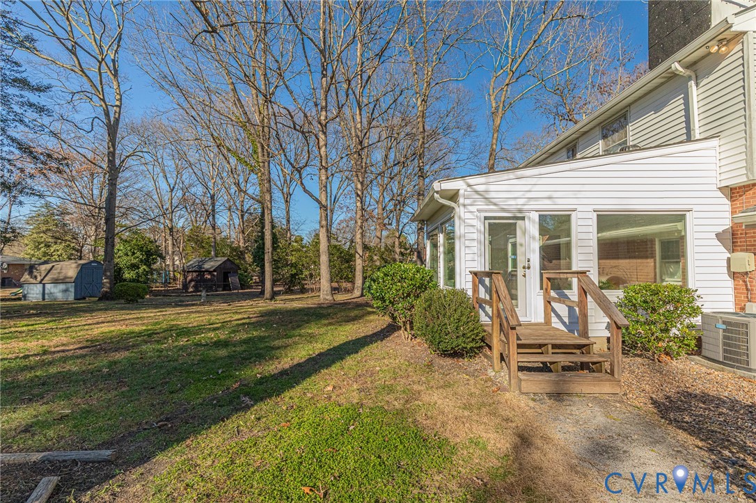 2820 Euphoria Road Chester, VA 23831 - Photo 36 of 38 View of grassy yard with a storage shed
