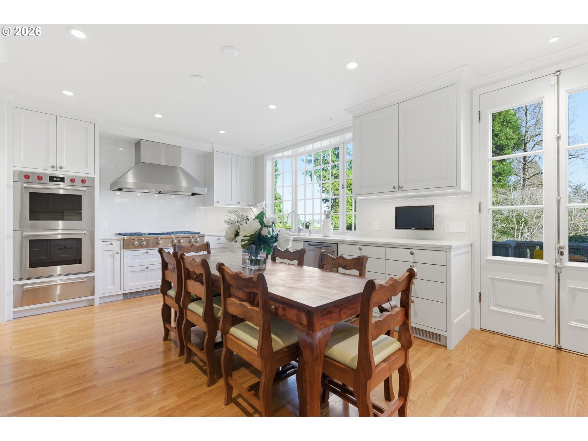 2393 South Military Road Portland, OR 97219 - Photo 13 of 48 a view of a dining room with furniture and wooden floor
