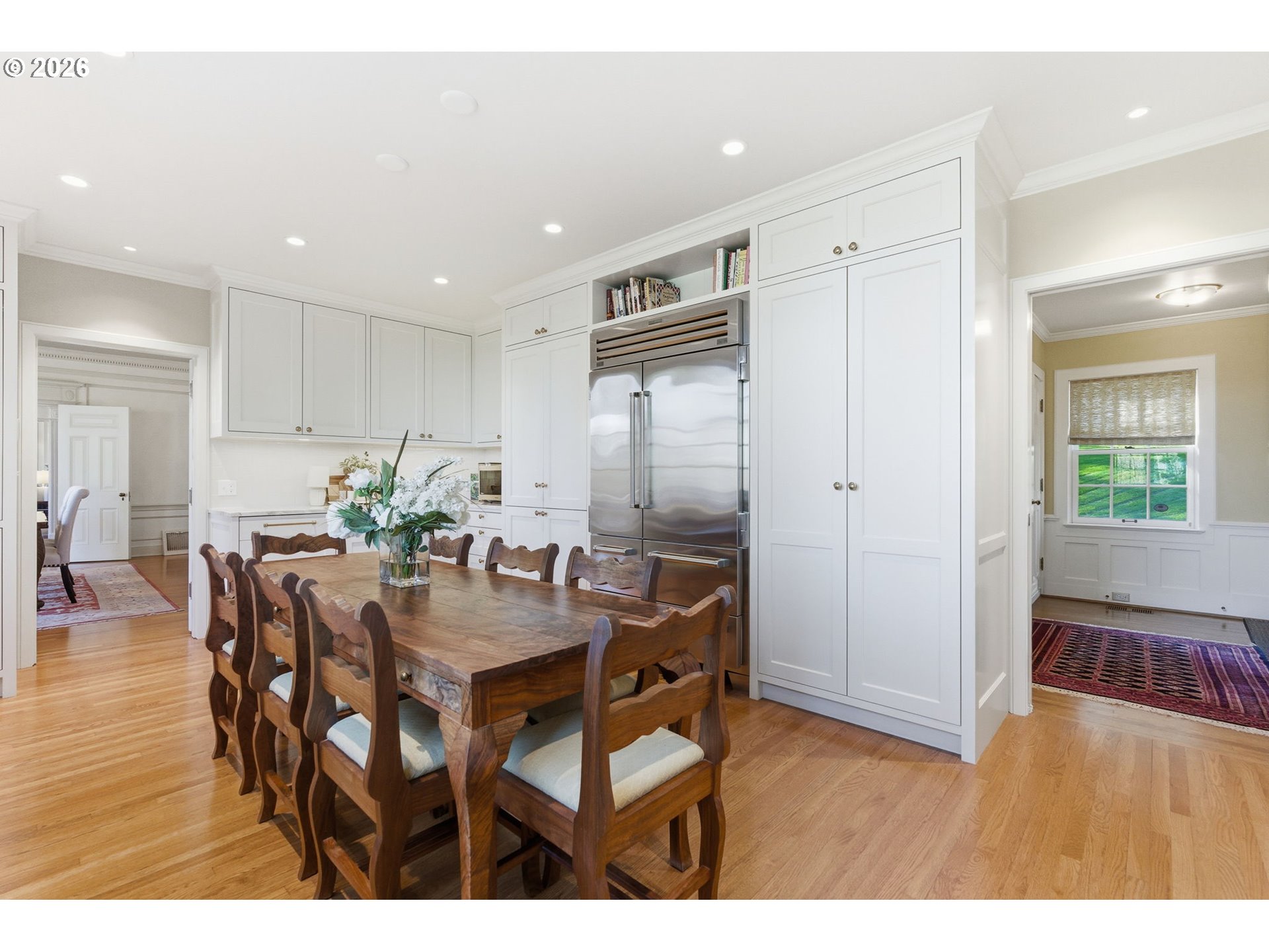 2393 South Military Road Portland, OR 97219 - Photo 15 of 48 a view of a dining room with furniture and wooden floor