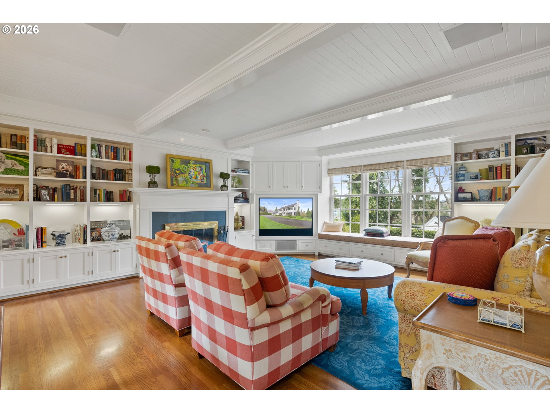 2393 South Military Road Portland, OR 97219 - Photo 18 of 48 a living room with fireplace furniture and a flat screen tv