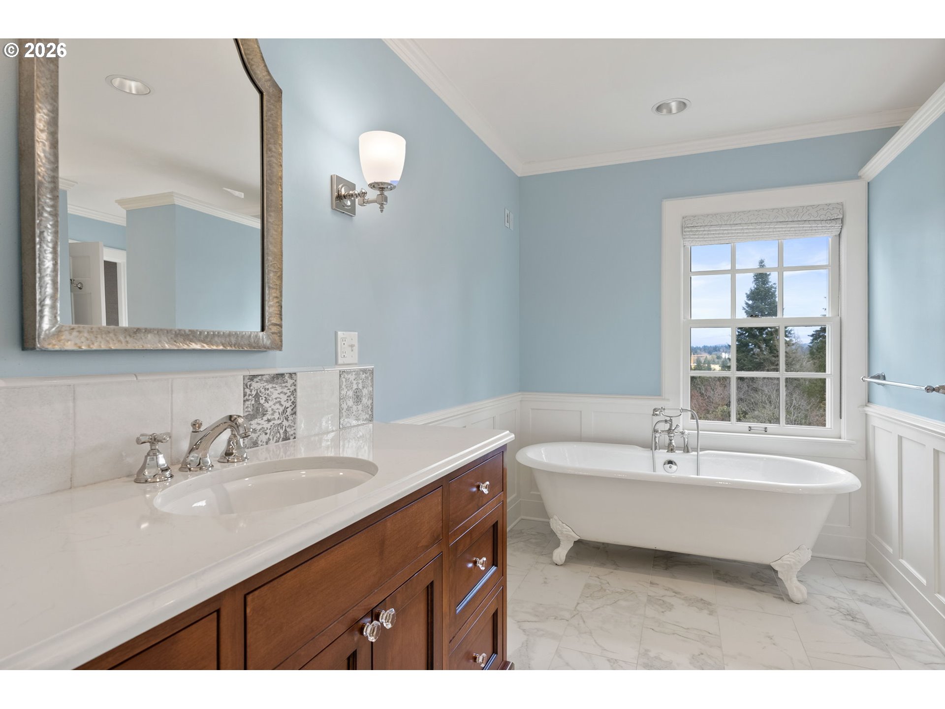 2393 South Military Road Portland, OR 97219 - Photo 26 of 48 a bathroom with a sink double vanity mirror and a bathtub