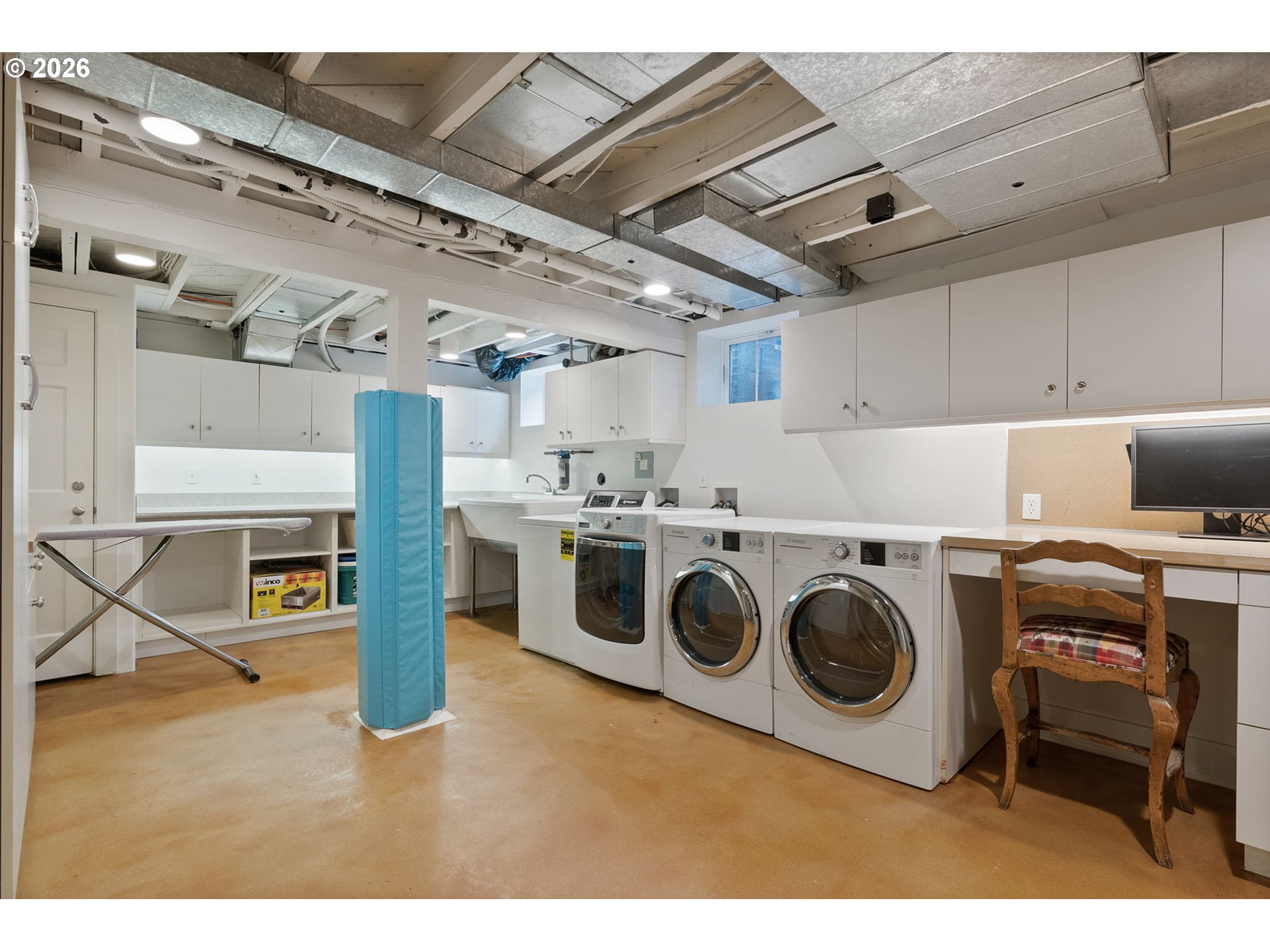 2393 South Military Road Portland, OR 97219 - Photo 34 of 48 a utility room with dryer washer and stair