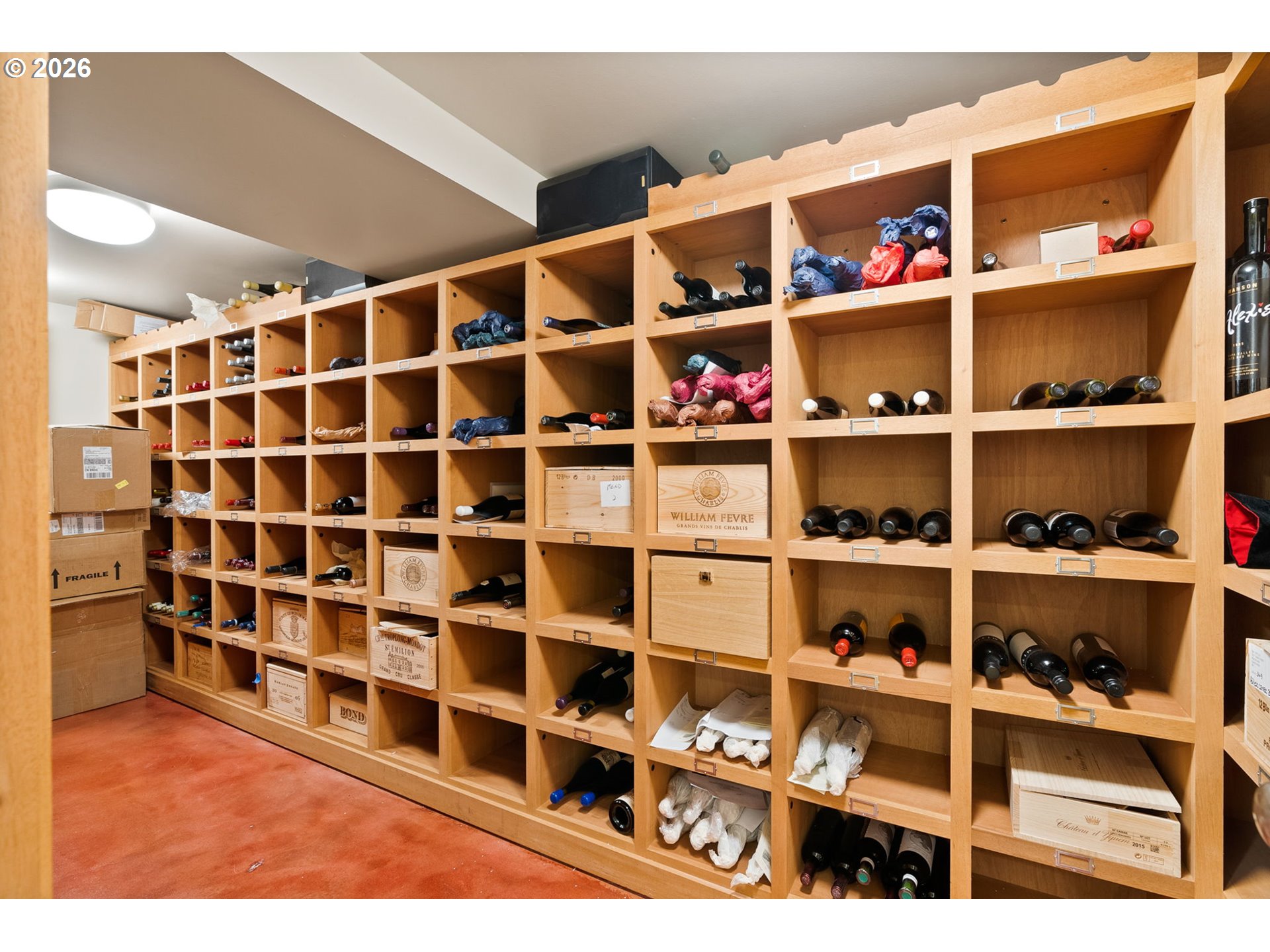 2393 South Military Road Portland, OR 97219 - Photo 35 of 48 a view of walk in closet with clothes and shoes