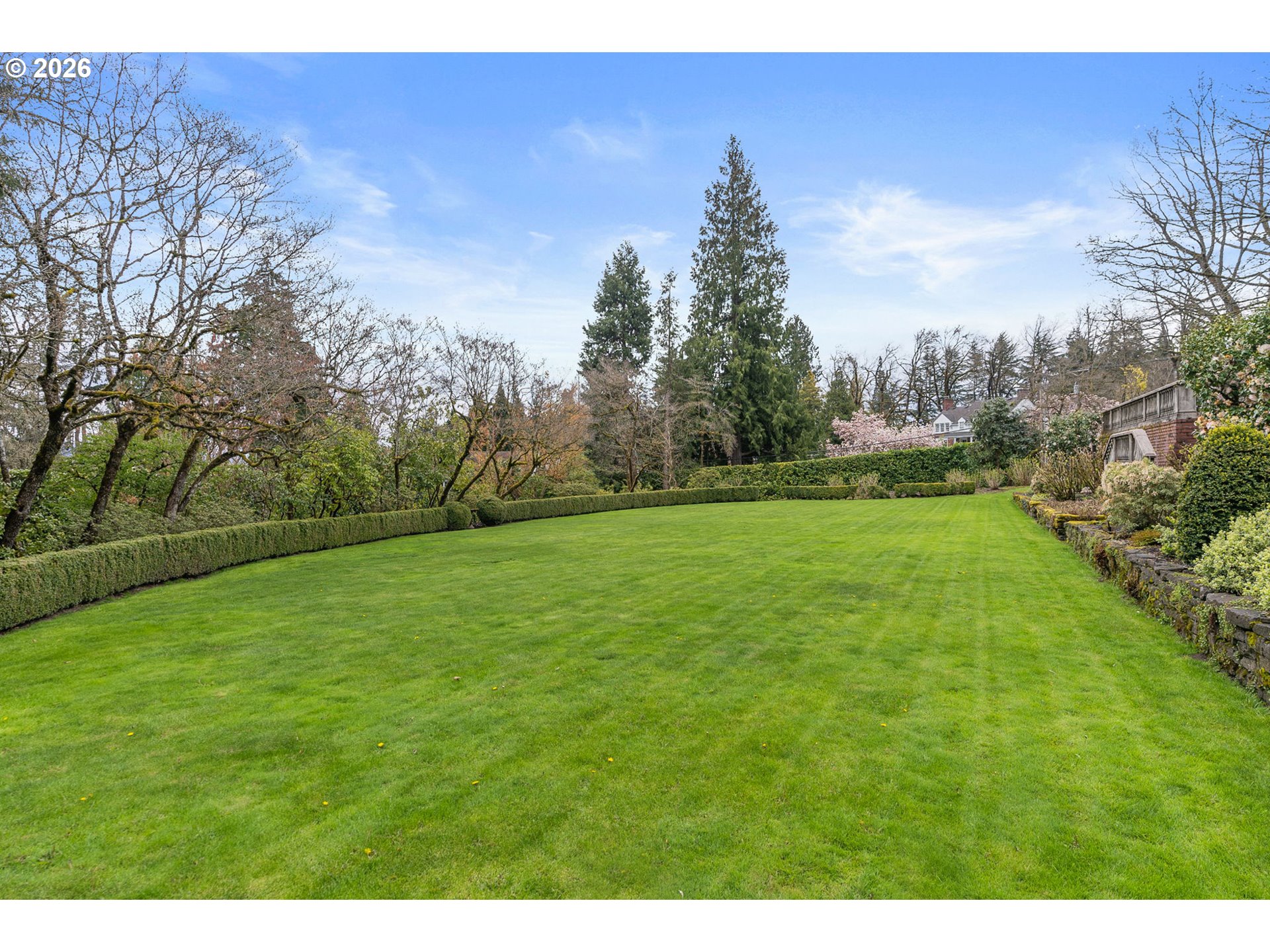 2393 South Military Road Portland, OR 97219 - Photo 37 of 48 a view of a field of grass and trees