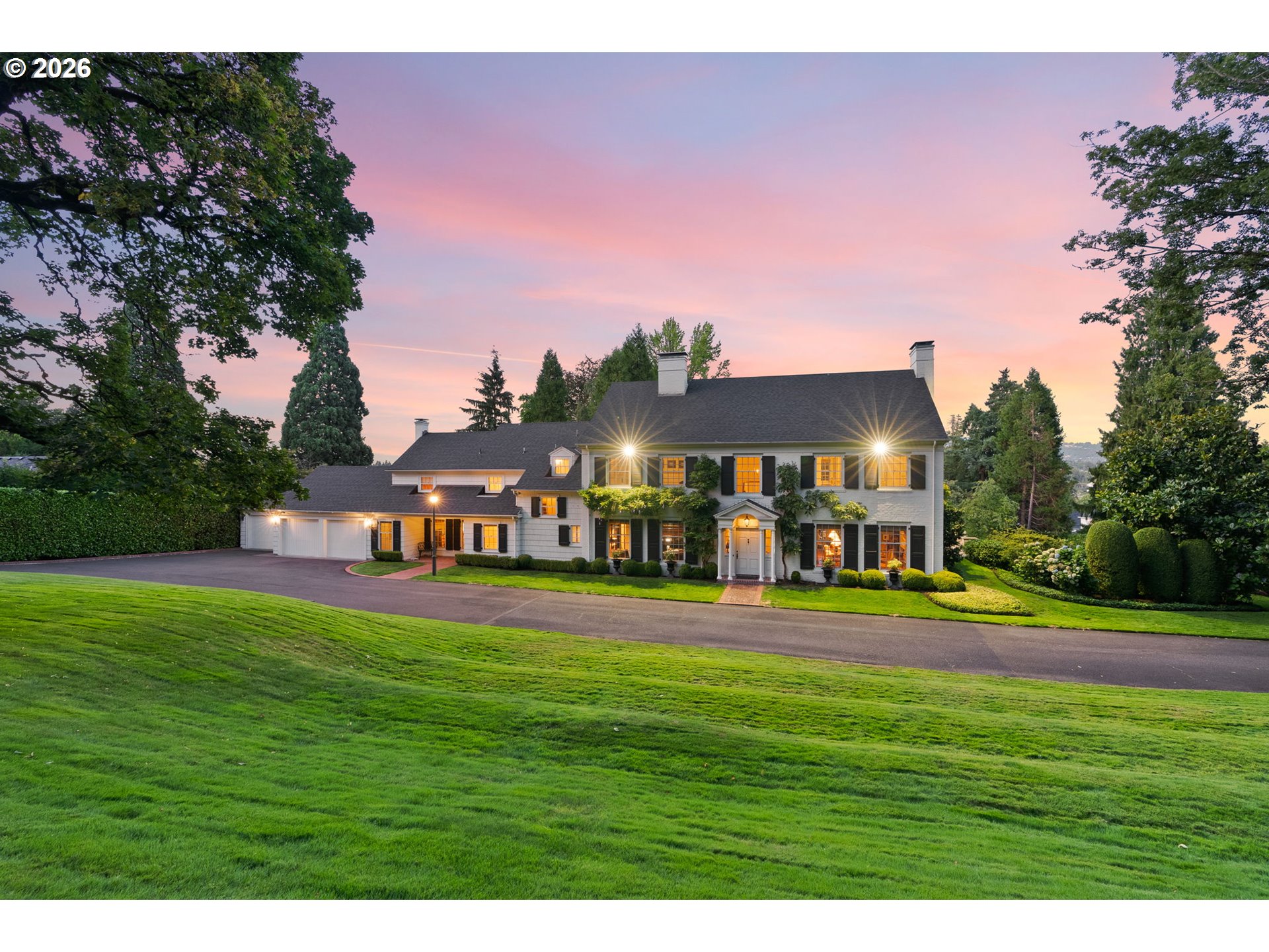 2393 South Military Road Portland, OR 97219 - Photo 4 of 48 a view of a big room with a big yard and large trees