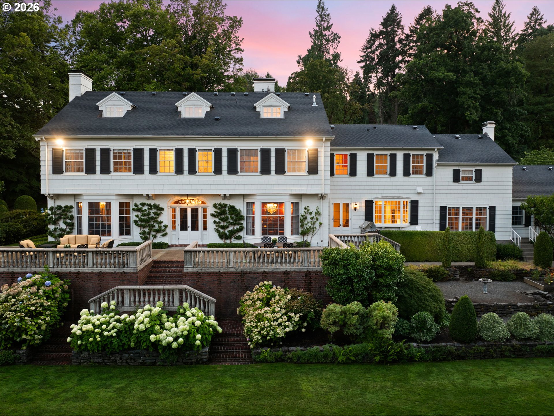 2393 South Military Road Portland, OR 97219 - Photo 44 of 48 a front view of a house with a garden