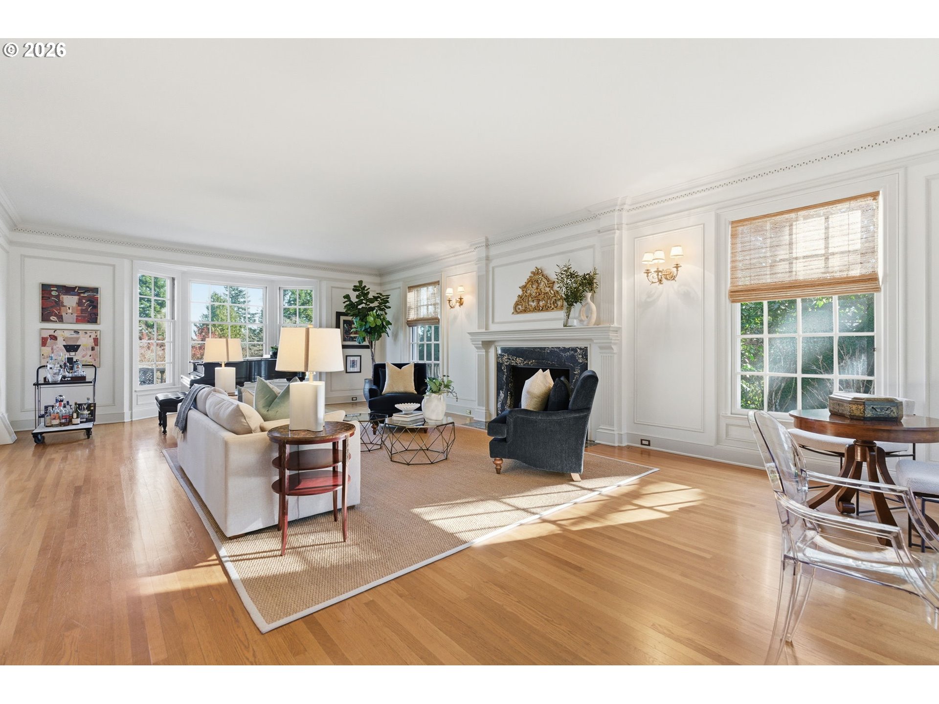 2393 South Military Road Portland, OR 97219 - Photo 7 of 48 a living room with furniture a fireplace and a table