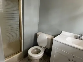 a bathroom with a sink and toilet