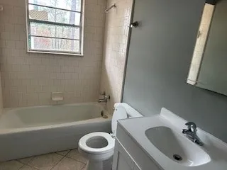 a bathroom with a sink and a bathtub