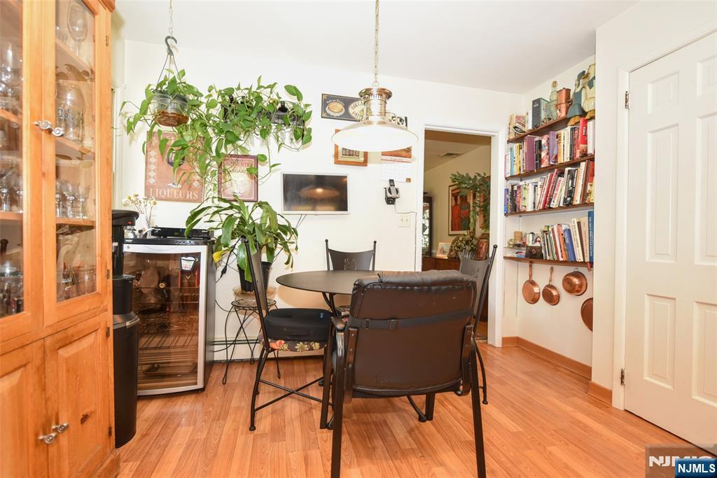 951 Berdan Avenue Wayne, NJ 07470 - Photo 13 of 39 a view of a dining room with furniture window and wooden floor