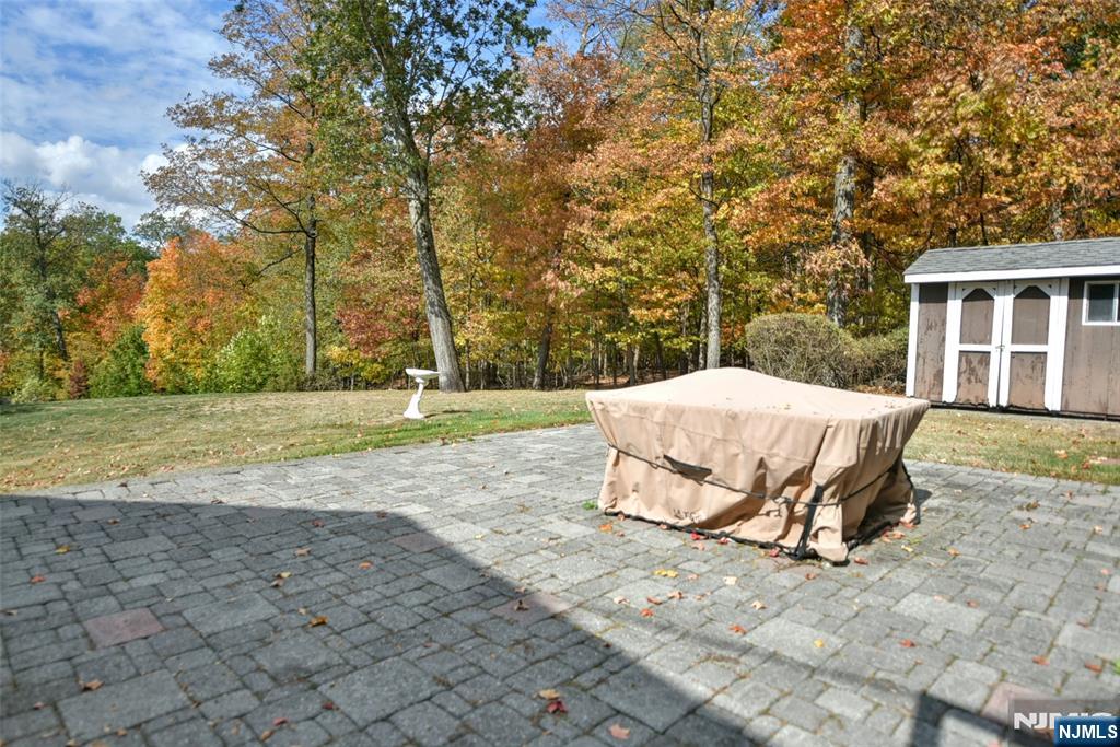 951 Berdan Avenue Wayne, NJ 07470 - Photo 31 of 39 a view of a house with backyard and trees