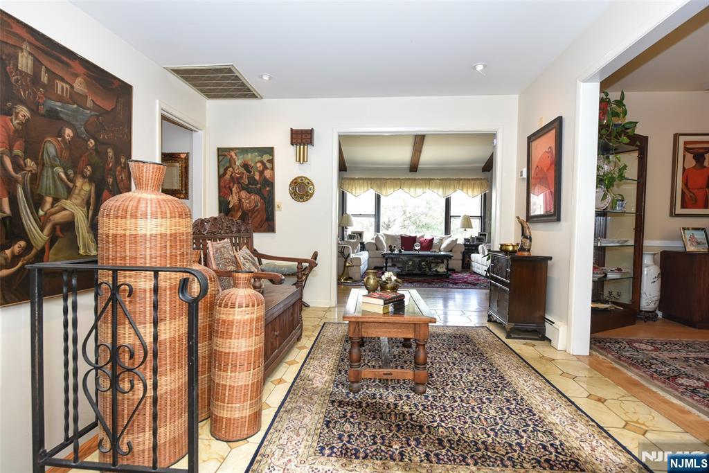951 Berdan Avenue Wayne, NJ 07470 - Photo 4 of 39 a living room with furniture rug and wooden floor