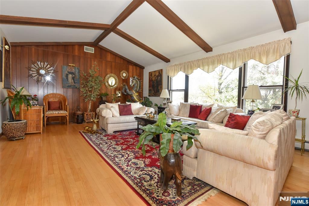951 Berdan Avenue Wayne, NJ 07470 - Photo 7 of 39 a living room with furniture and a large window