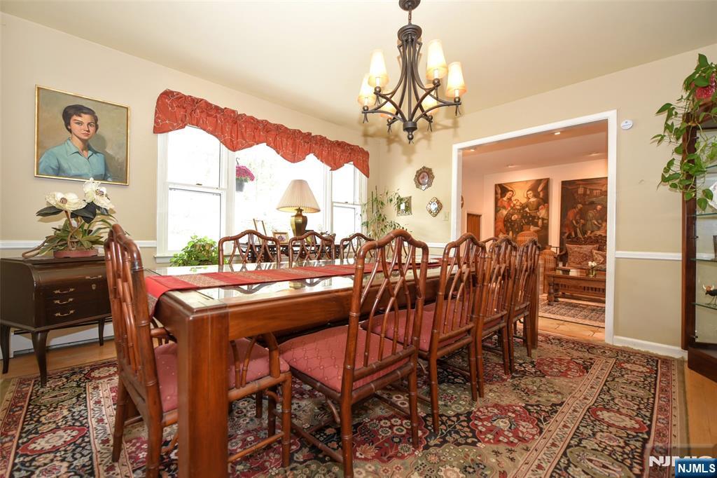 951 Berdan Avenue Wayne, NJ 07470 - Photo 10 of 39 a view of a dining room with furniture window and wooden floor