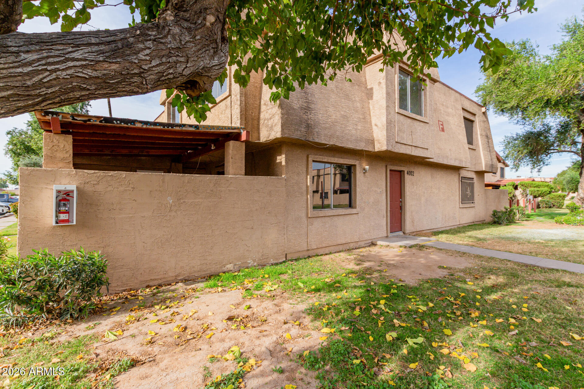 a backyard of a house with lots of green space