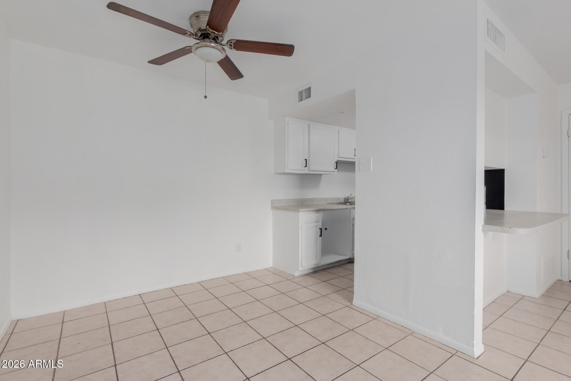 4002 West Palomino Road Phoenix, AZ 85019 - Photo 7 of 23 a view of an empty room and window
