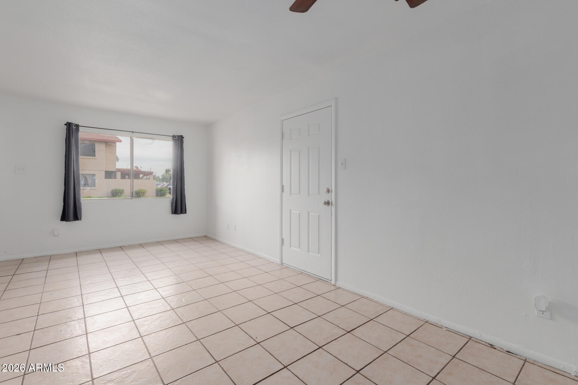 4002 West Palomino Road Phoenix, AZ 85019 - Photo 8 of 23 a view of an empty room and window