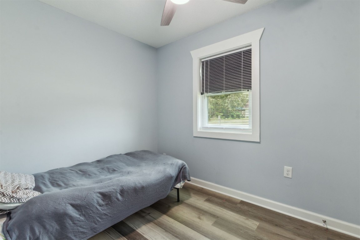 914 Jasmine Street Fernandina Beach, FL 32034 - Photo 12 of 19 a bedroom with a bed and a window