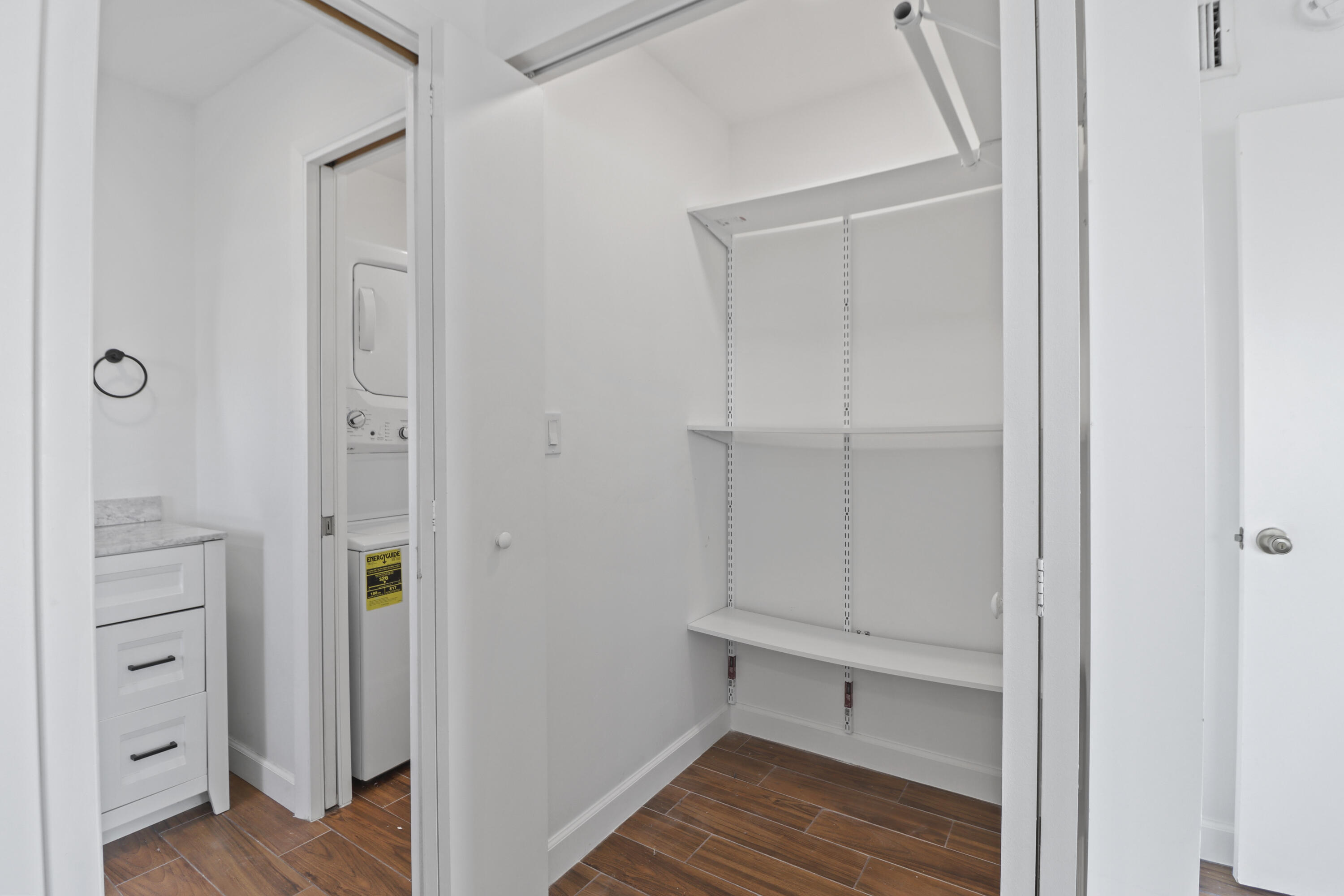 201 Coppitt Road, Unit 301A Key West, FL 33040 - Photo 16 of 25 a view of room with wooden floor