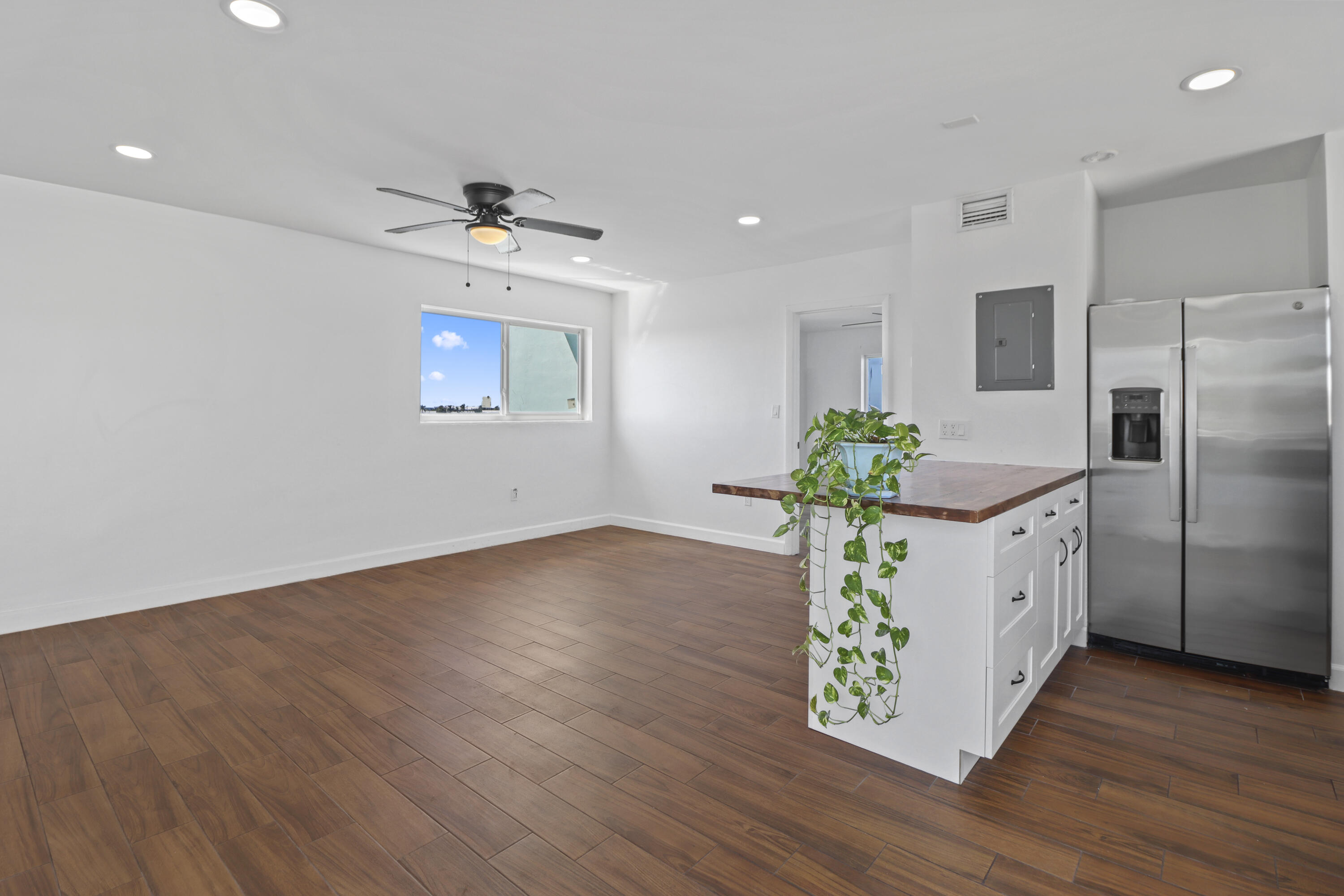 201 Coppitt Road, Unit 301A Key West, FL 33040 - Photo 19 of 25 a kitchen with a refrigerator and a stove top oven