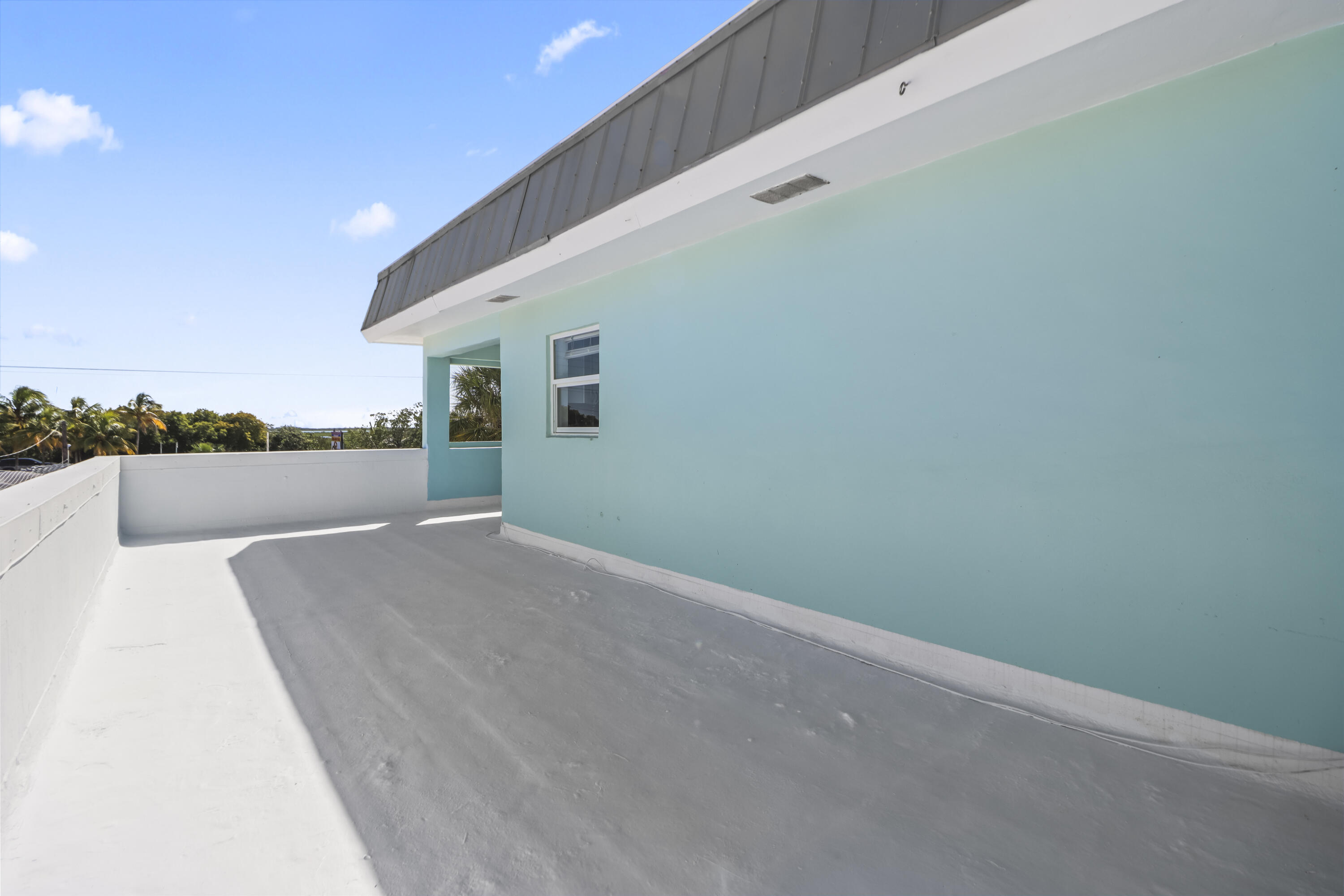 201 Coppitt Road, Unit 301A Key West, FL 33040 - Photo 21 of 25 a view of a big room with wooden fence