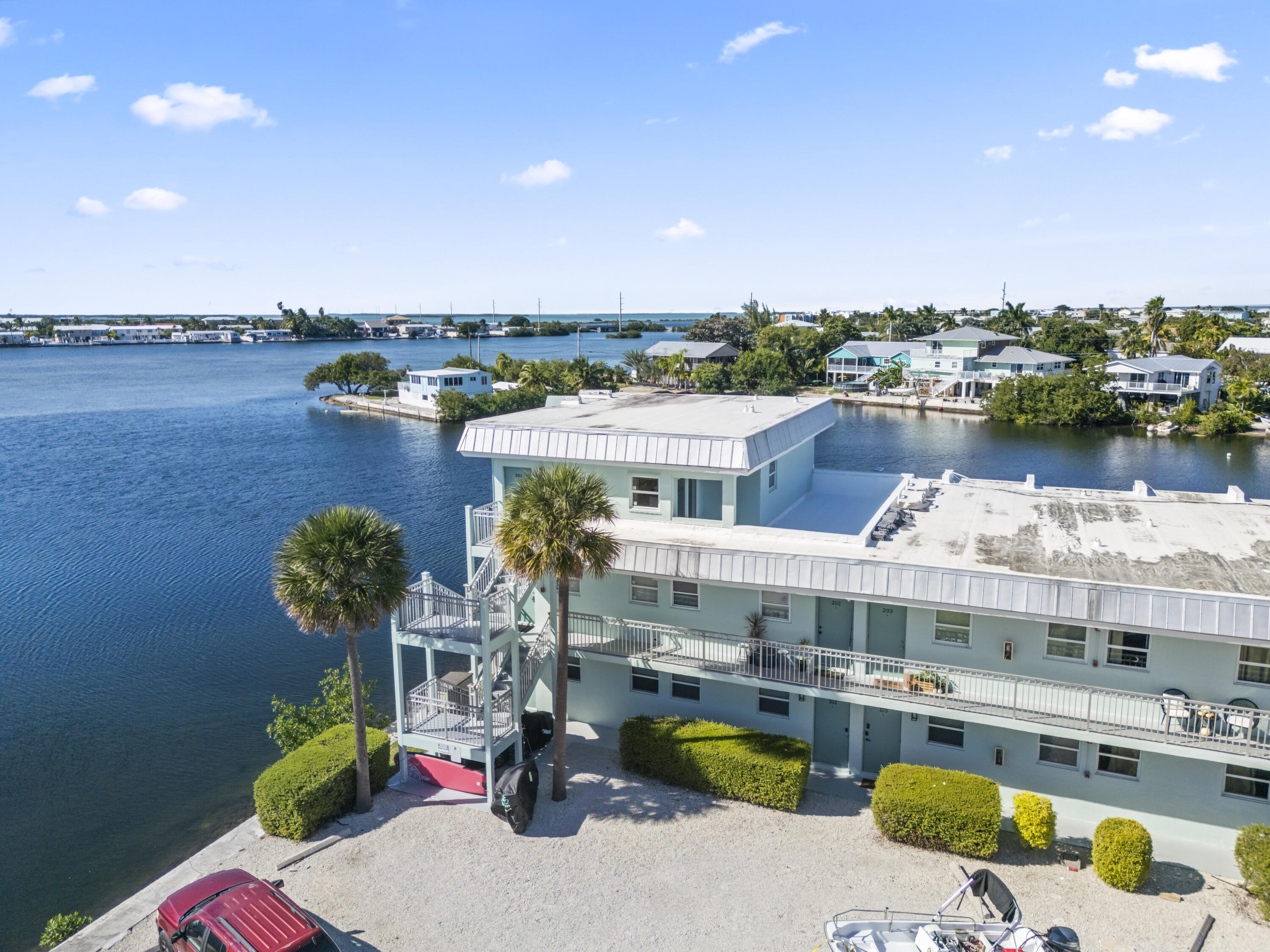 201 Coppitt Road, Unit 301A Key West, FL 33040 - Photo 24 of 25 a view of a lake with a house
