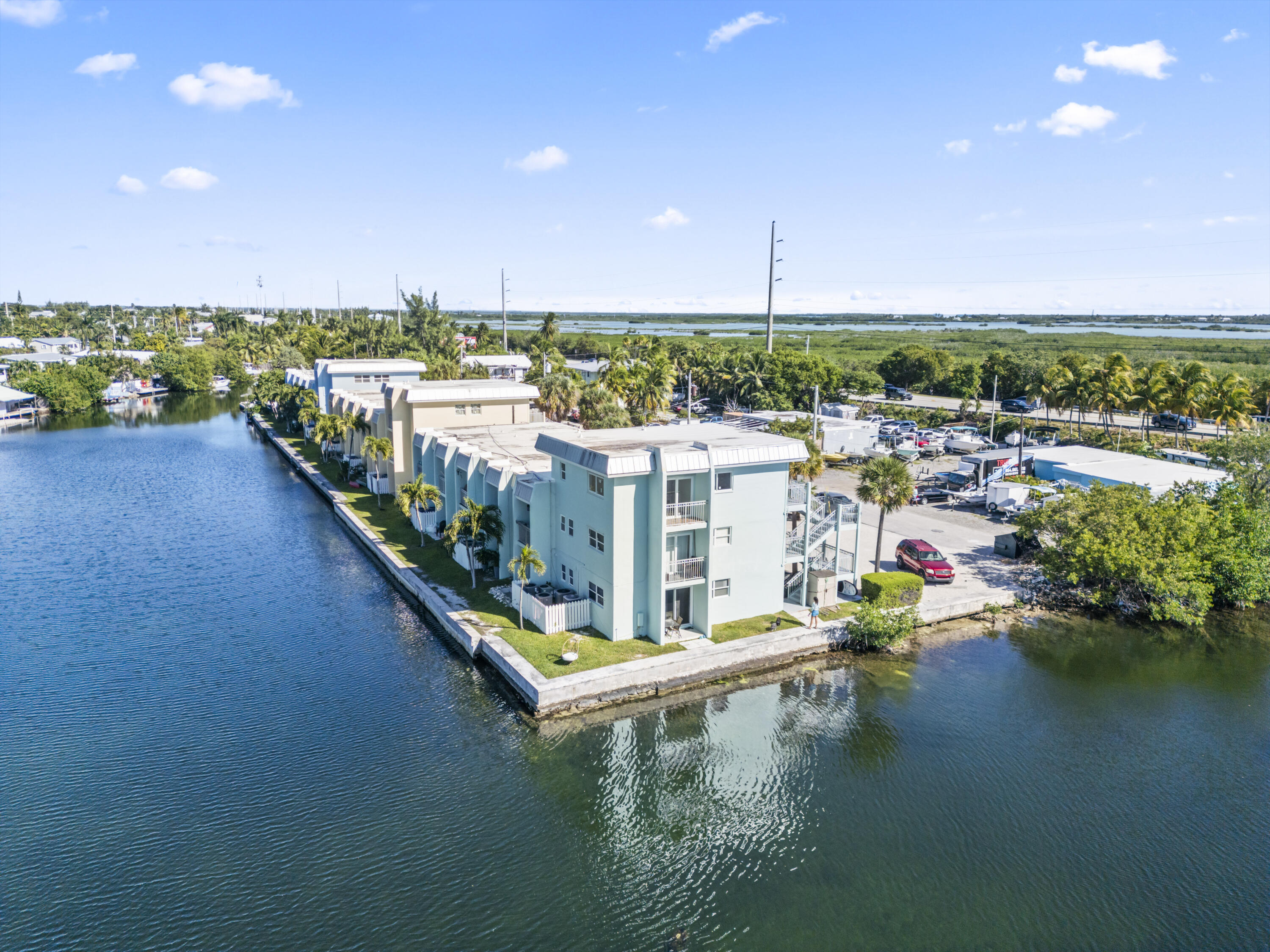 201 Coppitt Road, Unit 301A Key West, FL 33040 - Photo 3 of 25 a view of an ocean from a balcony with outdoor space