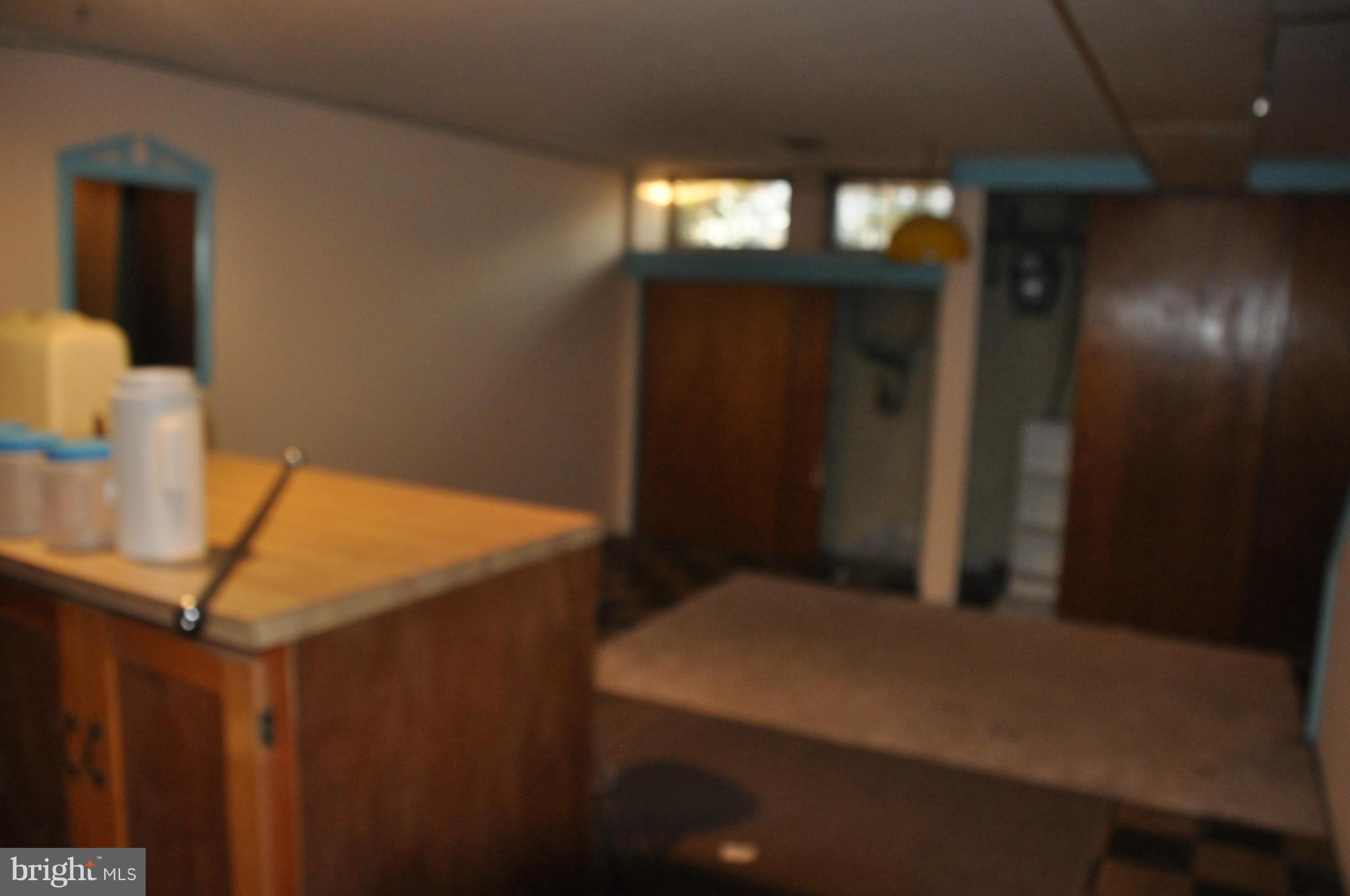 7438 Edsworth Road Baltimore, MD 21222 - Photo 10 of 12 a view of an empty room