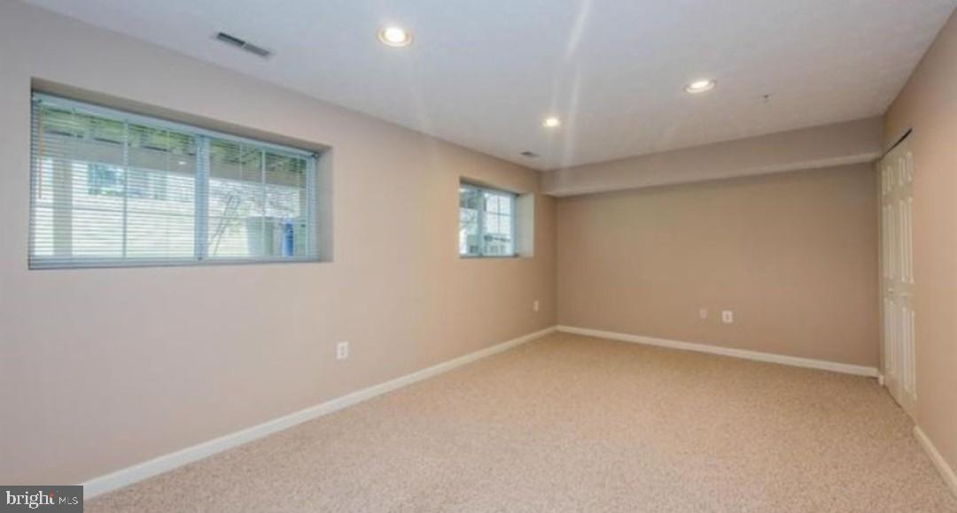 7151 Natures Road Columbia, MD 21046 - Photo 19 of 33 a view of an empty room with a window