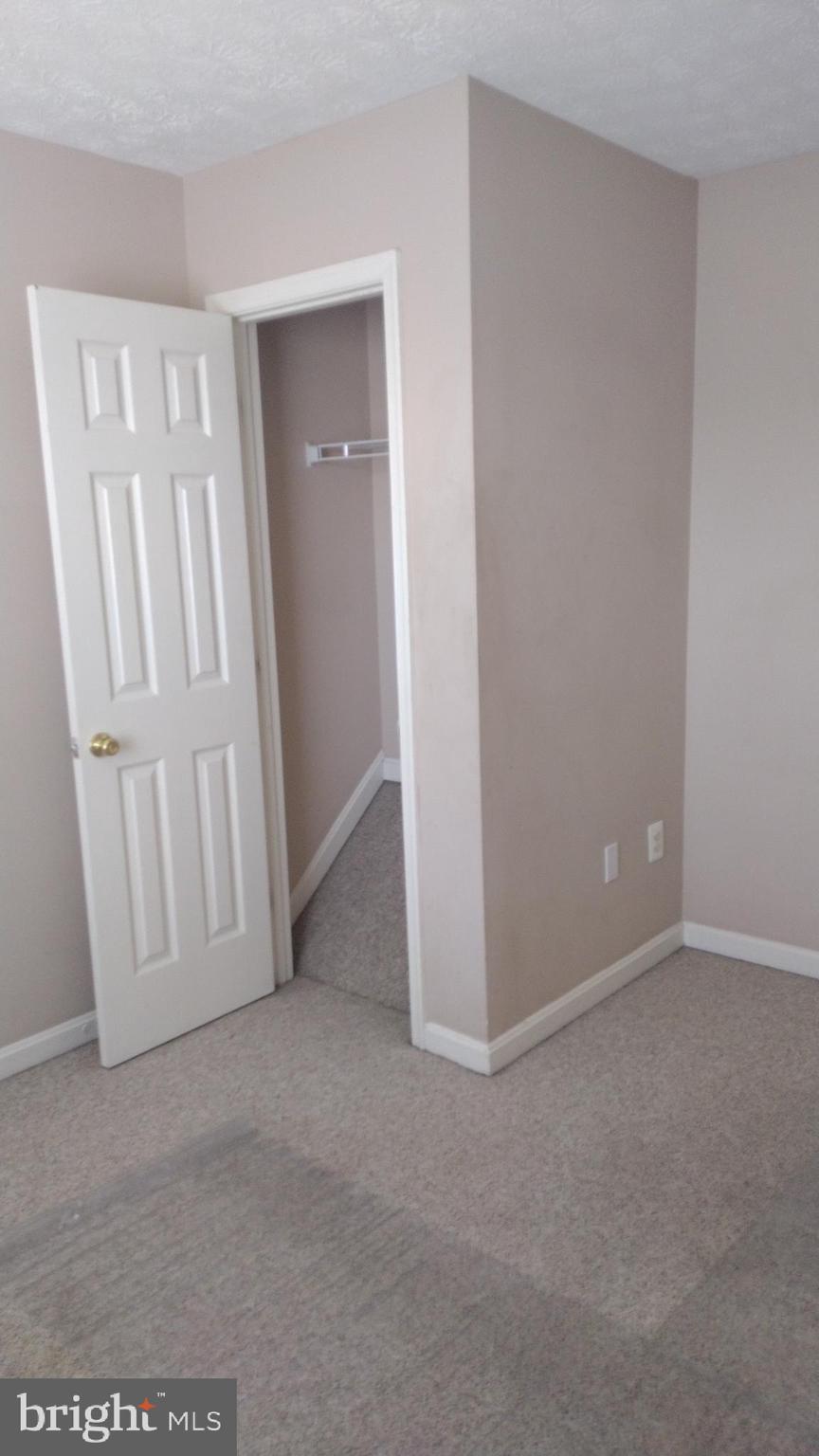 7151 Natures Road Columbia, MD 21046 - Photo 21 of 33 an empty room with windows