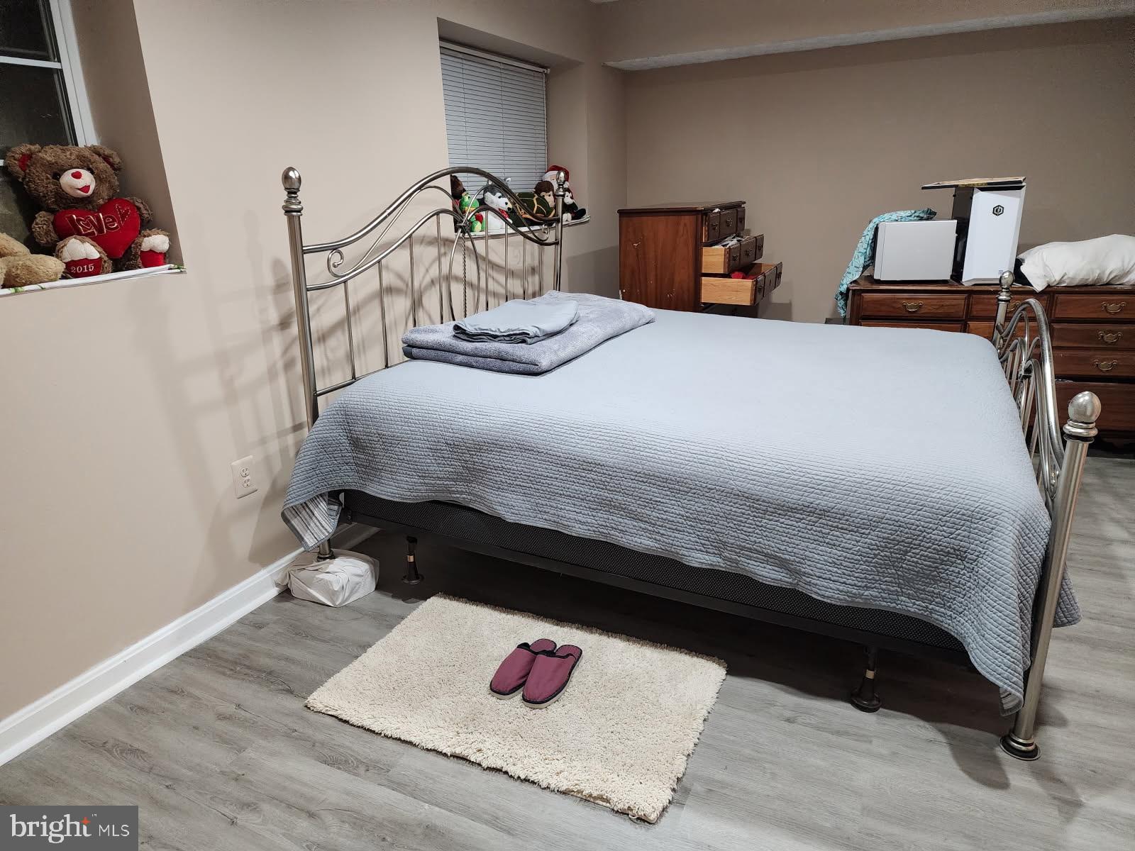 7151 Natures Road Columbia, MD 21046 - Photo 24 of 33 a bedroom with a bed and dresser