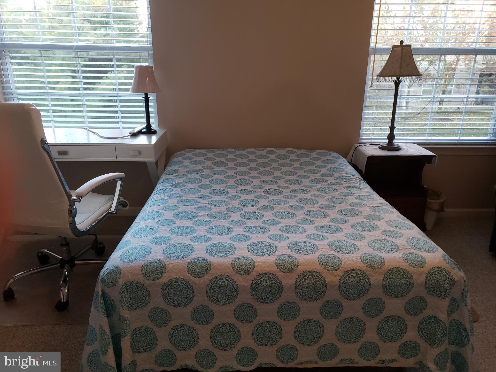 7151 Natures Road Columbia, MD 21046 - Photo 27 of 33 a bedroom with a bed and a window