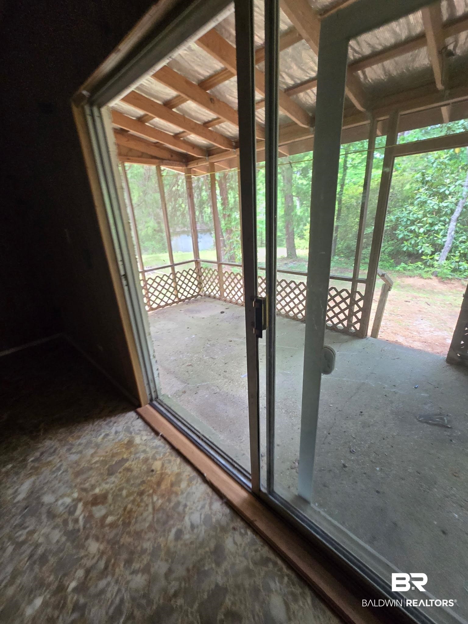 8731 Byrnes Lake Road Bay Minette, AL 36507 - Photo 12 of 14 Doorway featuring a healthy amount of sunlight