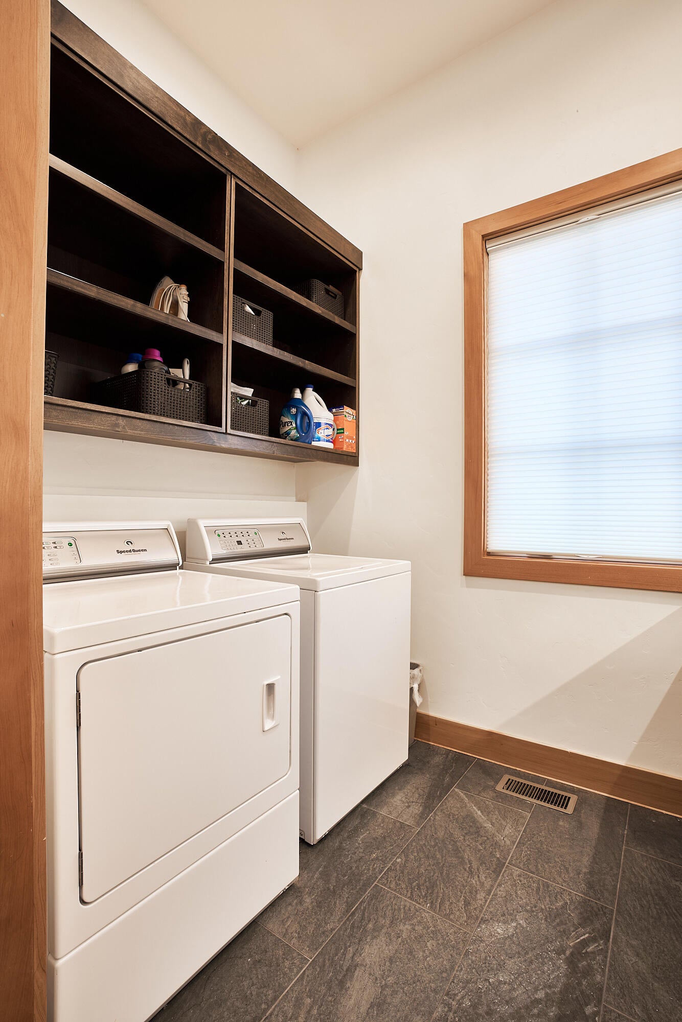 19525 Innes Market Road Bend, OR 97703 - Photo 17 of 56 The Main Home's laundry room with Speed Queen washer and dryer.