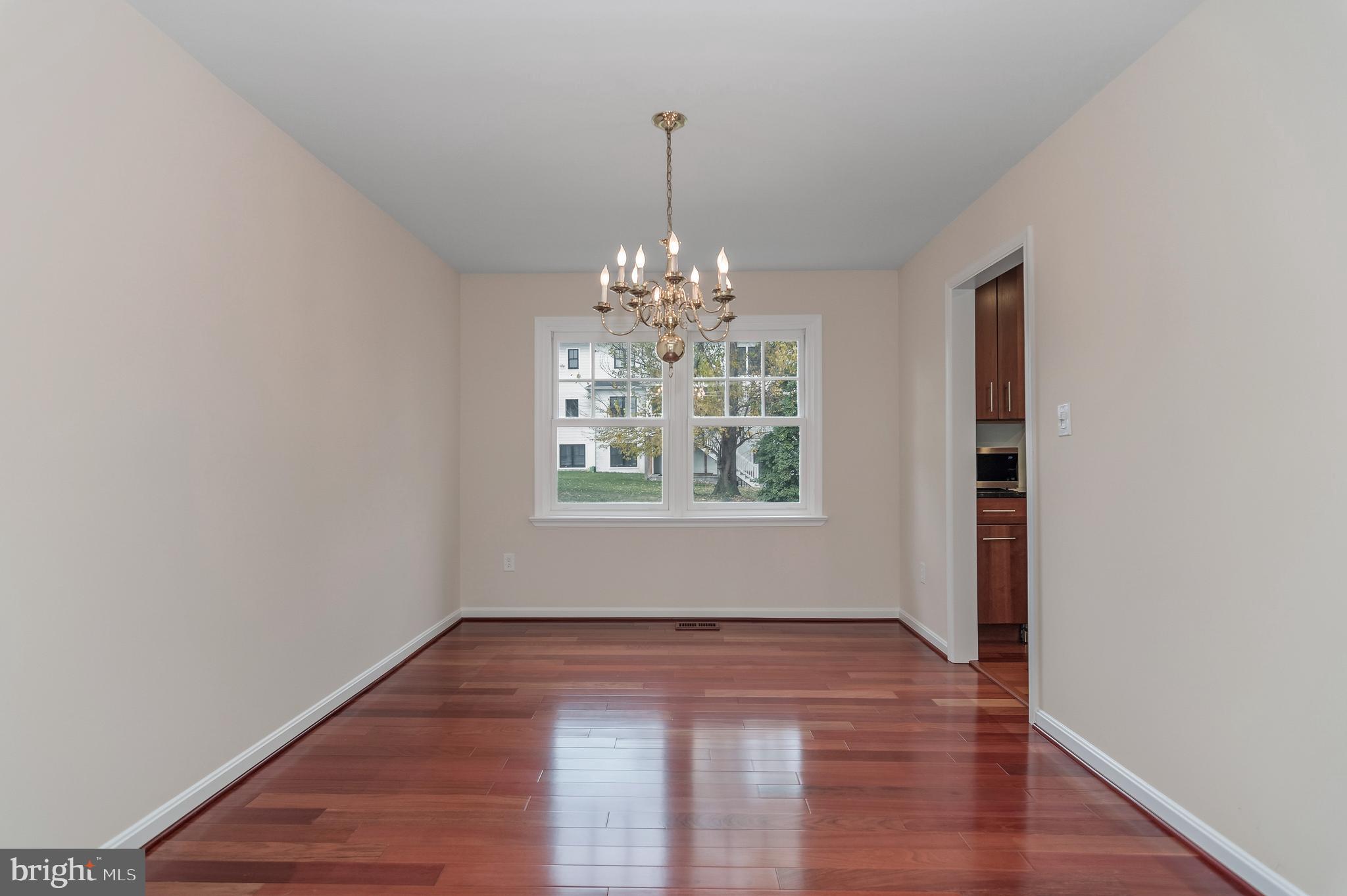 4043 20th Road North Arlington, VA 22207 - Photo 13 of 56 wooden floor in an empty room with a window