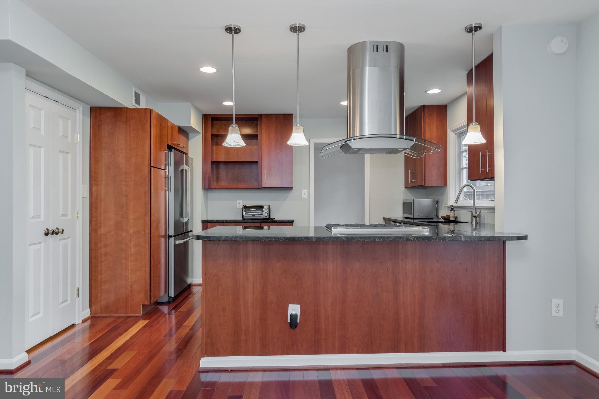 4043 20th Road North Arlington, VA 22207 - Photo 19 of 56 a kitchen with stainless steel appliances a refrigerator sink and stove