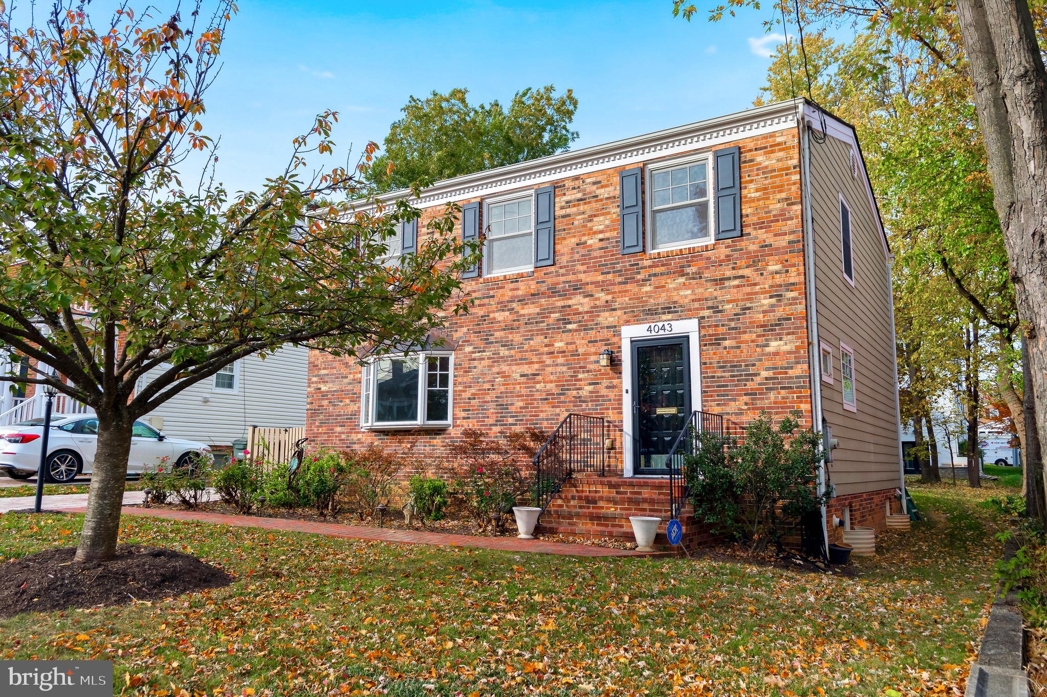 4043 20th Road North Arlington, VA 22207 - Photo 2 of 56 a front view of a house with a yard