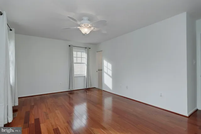 a bathroom with a sink toilet vanity and shower