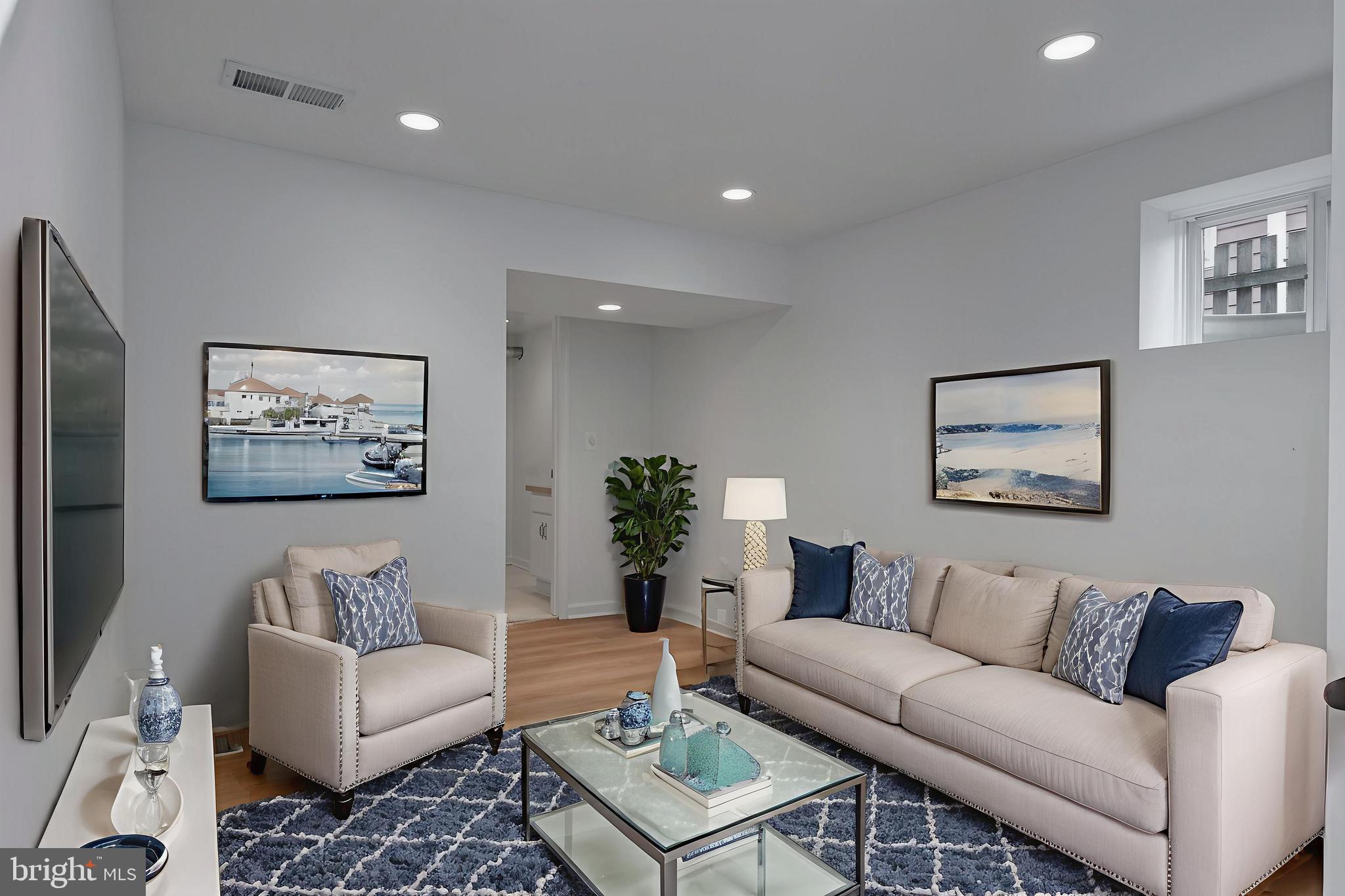 4043 20th Road North Arlington, VA 22207 - Photo 44 of 56 a living room with furniture and a couch